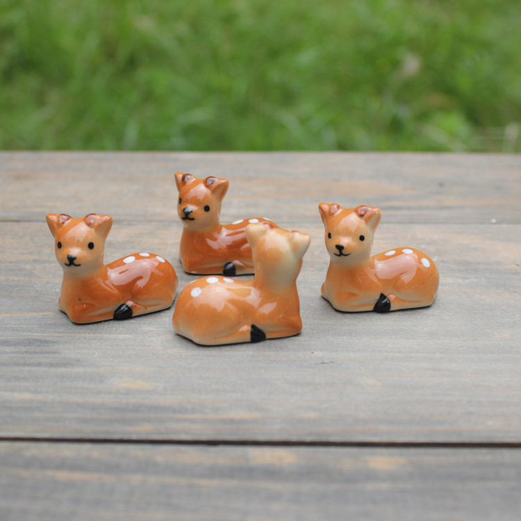 Picture of Ceramic crafts ornaments 12592 deer chopsticks rack sika deer chopsticks rack pen rack factory direct wholesale