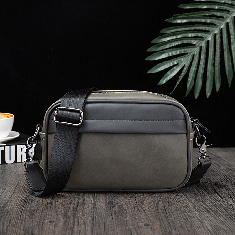 Picture of Korean fashion Men's messenger bag 2024 New retro solid color small backpack casual shoulder phone bag for men