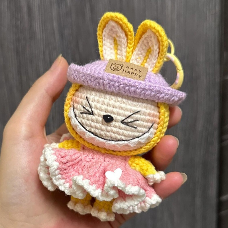 Picture of Couple bag pendant handmade wool knitting DIY filibuster cloth enamel face doll keychain material bag DIY