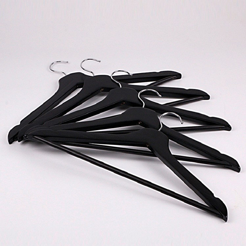 Picture of First-class flat head solid wood hanger black and white men's clothes drying rack home wardrobe clothes rack black wooden hanger wholesale