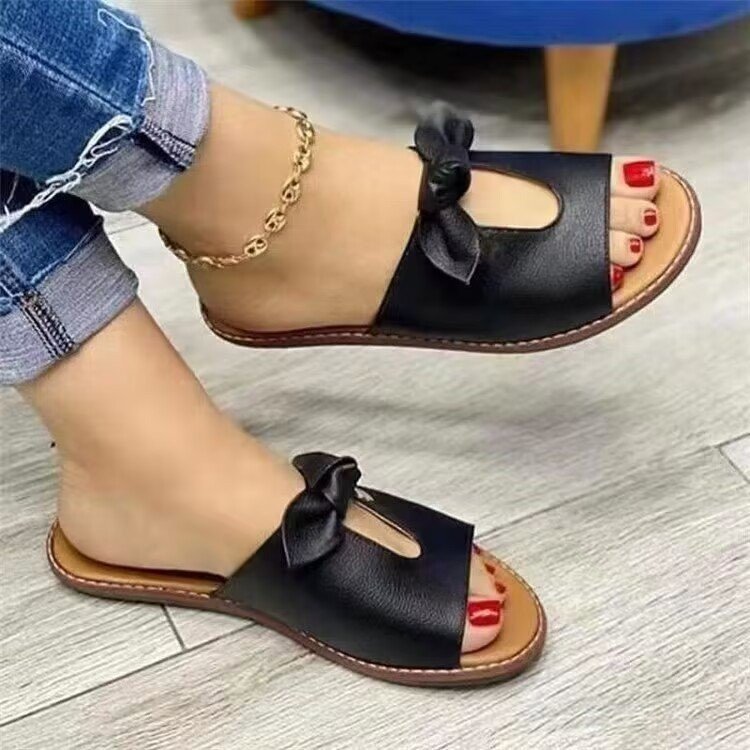 Korean version of solid color bow flat slippers women manufacturers wholesale casual fashion slippers women foreign trade home sandals