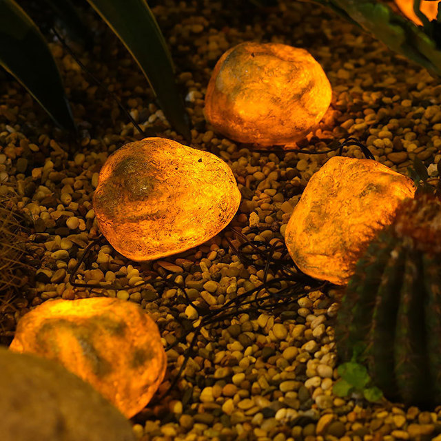 Solar-powered simulated cow dung stone lights, outdoor garden lawn lights, park plaza decorative landscape lights