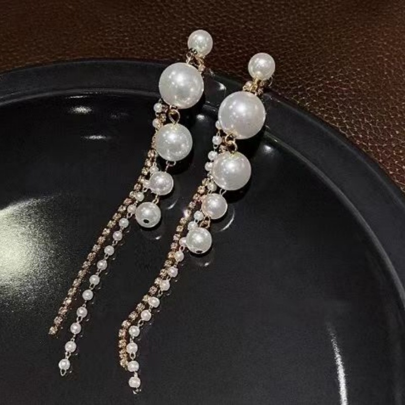 Picture of Dongdaemun s925 Silver Pin Earrings 2024 New Arrival Ear Drop Style Textured Internet Celebrity Ins Tassel Light Luxury Pearl Earrings