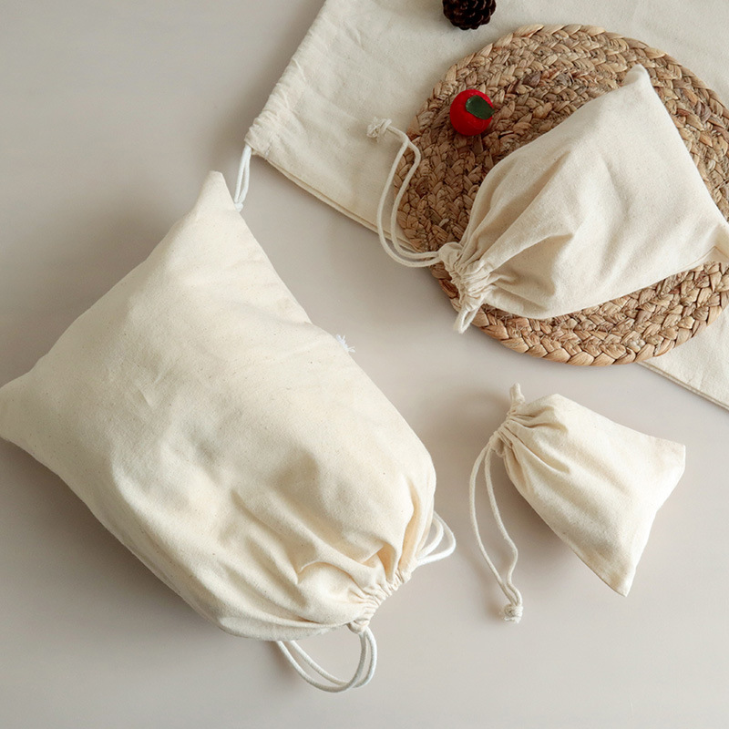 Picture of Drawstring Flap Pocket Pants Manufacturer Ready-Made Drawstring Cotton Bag Satchel Canvas Bag Drawstring Linen Bag 30*40cm Environmentally Friendly