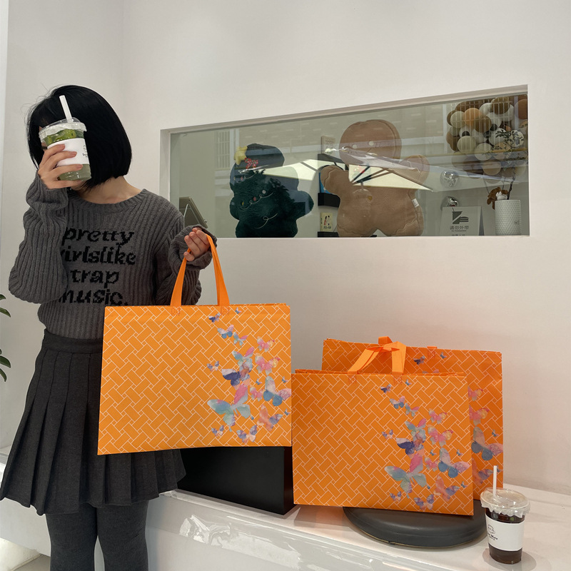 Non-woven clothing store handbag gift environmental protection bag packaging for clothes shopping women's clothing printing wholesale
