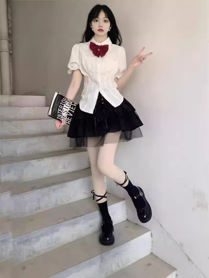 College style black puffy hip skirt 2024 autumn new high waist slimming A- line lace-up cake skirt
