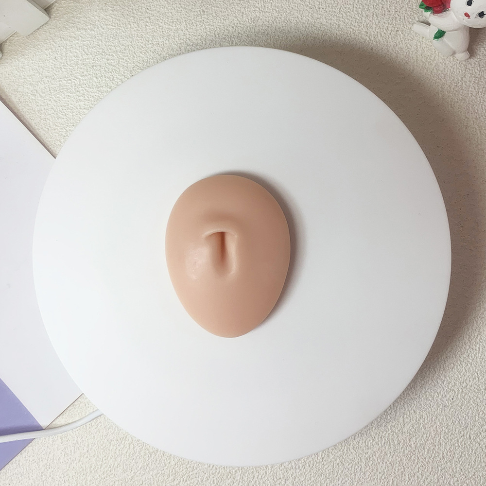 Picture of Silicone Ear Facial Features Model Nose Lip Model Training Posing Tool Nose Nail Tongue Nail Navel Nose Nail Display