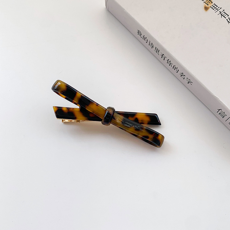 Picture of French Classic Bow Hairpin Acetic Acid Fresh Girl's Side Bangs Clip Cross Hollow Bow Tie Hairpin