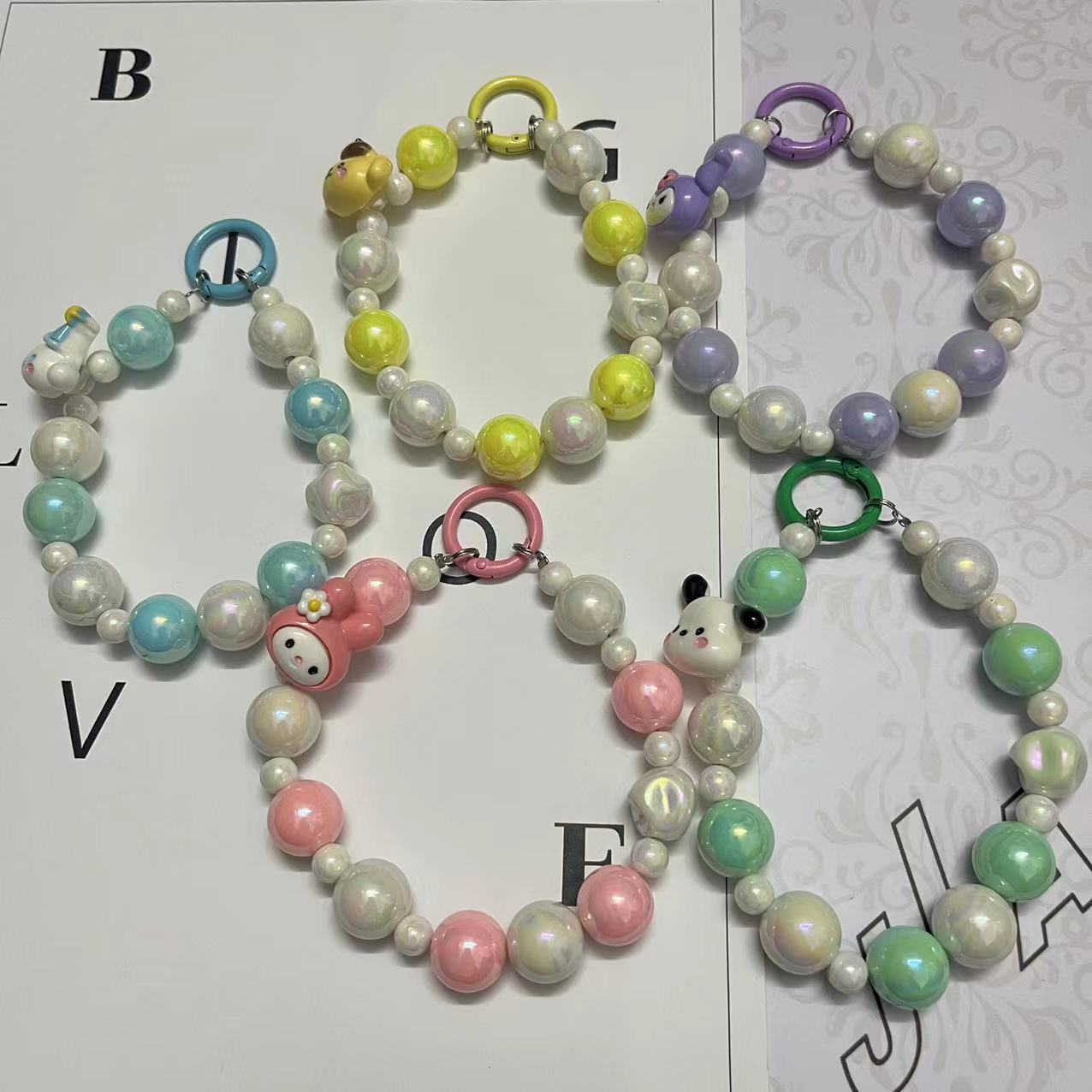 Picture of New Little Red Book Live Broadcast Hot sale colorful cartoon beaded chain handbag jewelry ornaments mobile phone key chain