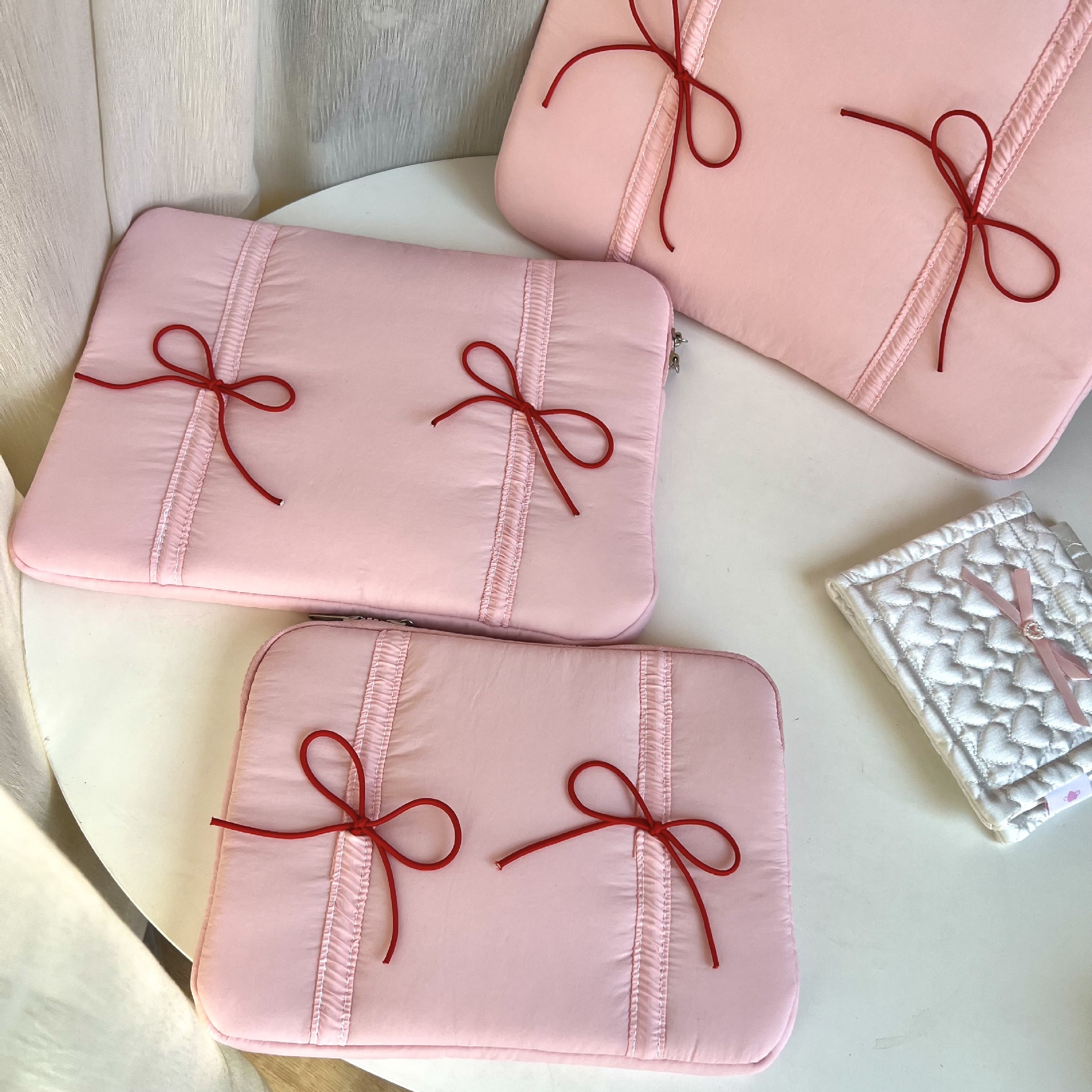 Picture of Cross-border South Korea tablet bag ins wind elastic tie bow 11/13/15 inch notebook liner bag