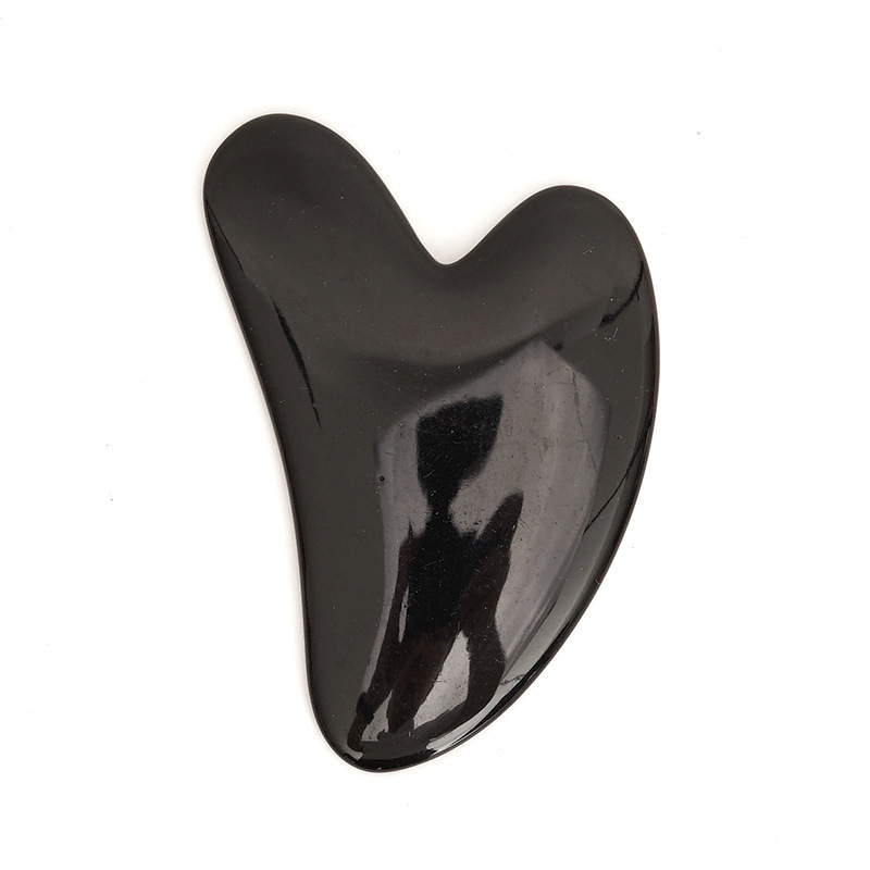Picture of Manufacturer's Wholesale Resin Heart-Shaped Gua Sha Tools for Massaging the Back, Neck, Waist, and Full Body Meridians, Made of Natural Materials