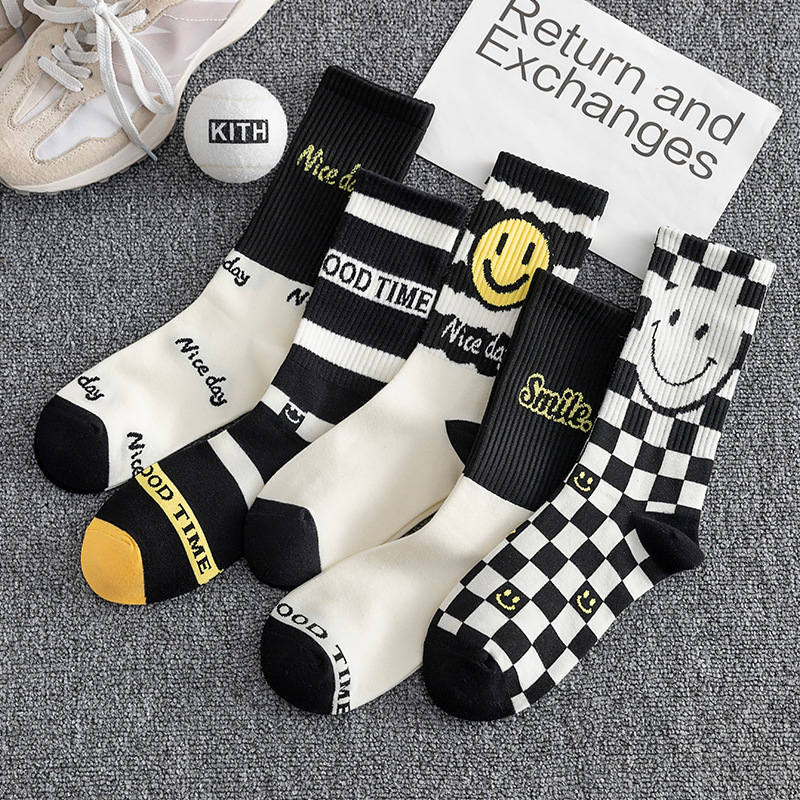 Black and white smiley face new socks women's autumn and winter combed cotton striped mid-calf length socks ins trendy couple sports stockings