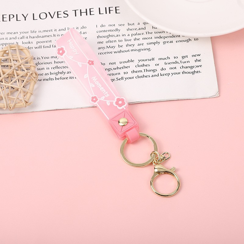 Picture of Transparent candy color soft rubber leather rope keychain small fresh flower creative small accessories cute women's exquisite hand strap