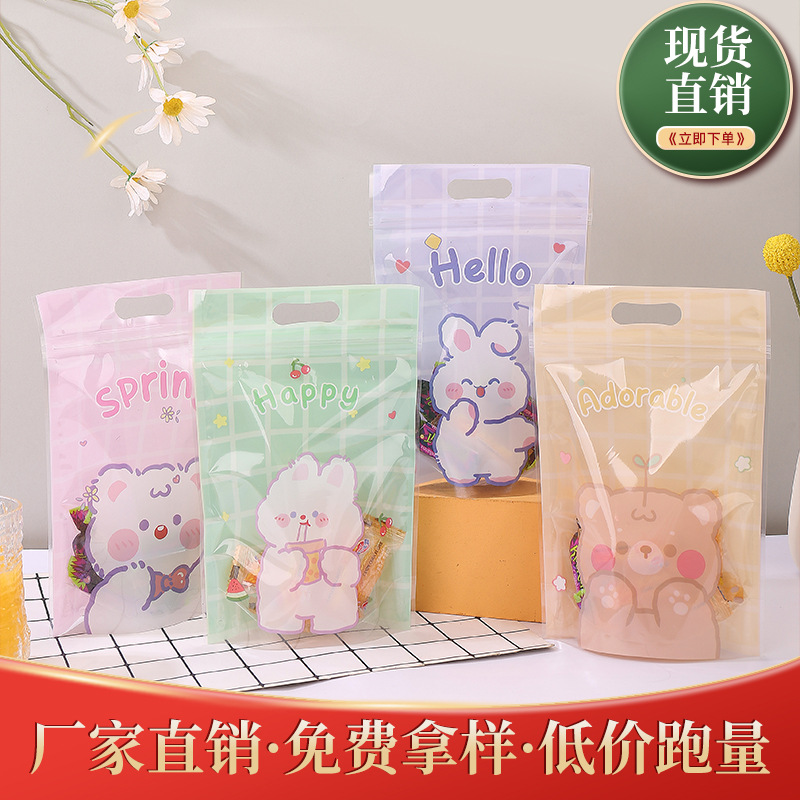 Color printing cartoon white rabbit toffee outer packaging self-sealing self-standing bag snacks biscuits peach crisp sealed storage zipper bag