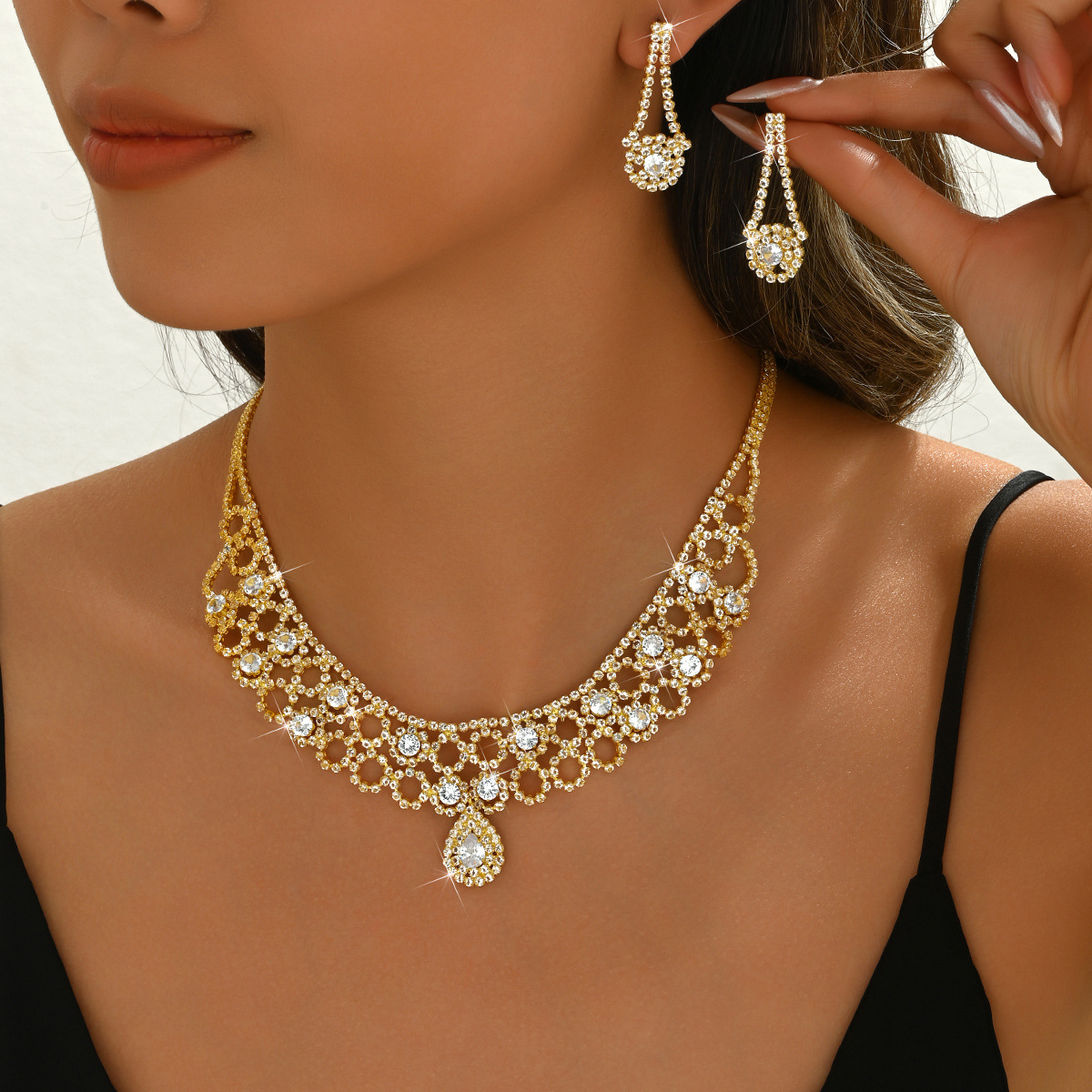 Pinduoduo cross-border water drop tassel necklace earrings bracelet suit Europe and the United States high-end Joker dress jewelry wholesale