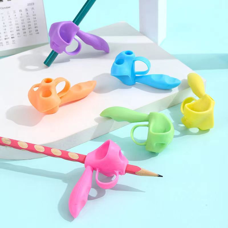 Picture of Five-finger pen grip corrector correction writing posture soft material Children's grip pen artifact suit