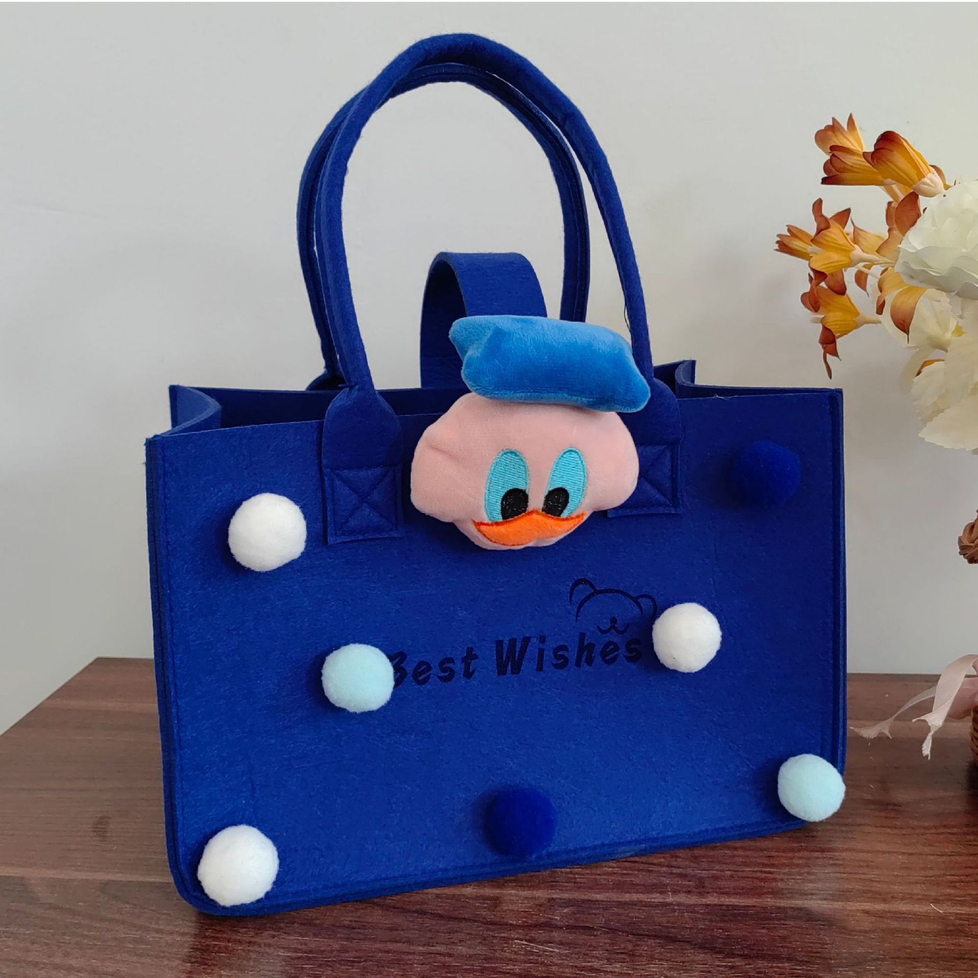 Picture of Wholesale cartoon felt handbag baby year old Full Moon wine hand gift bag large capacity cartoon felt shopping bag