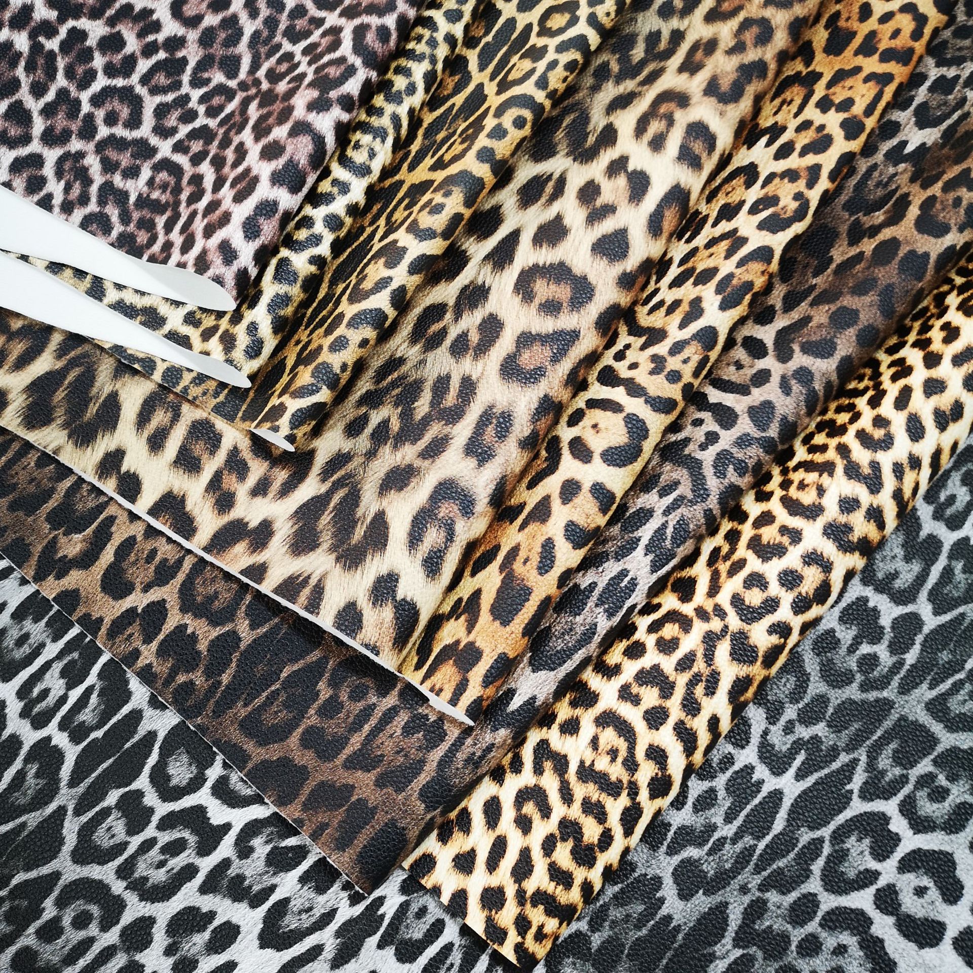 Picture of Guangzhou factory supply in stock wholesale leopard pu leather fabric mobile phone case packaging box luggage artificial leather