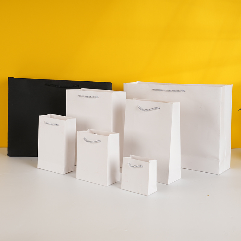 Spot White Cardboard Bag Clothing Store Shopping Tote Bag Corporate Advertising Gift Bag Cosmetics Eye Store Packaging Bag