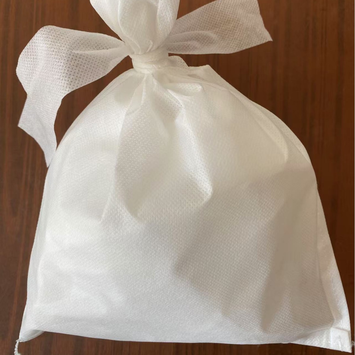 Picture of Wholesale 30*40 tie mouth disposable non-woven bag decocting bag slag bag filter bag bundle bag
