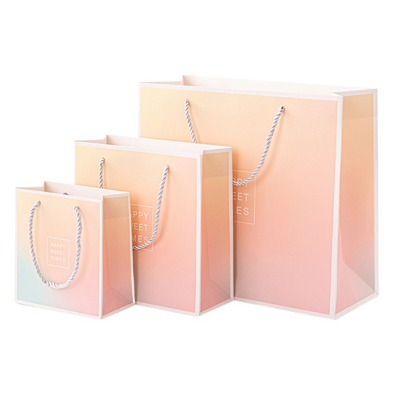 High-grade gift bag gradient color printing packaging bag handbag foreign trade paper bag with hand birthday gift clothing gift bag