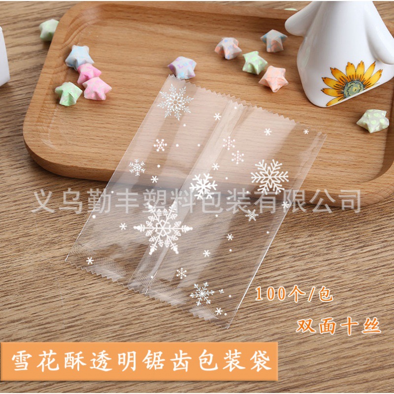 New snowflake crisp packing bag machine sealing cow tie biscuit bag transparent saw-tooth cow rolling mill sealing bag 100
