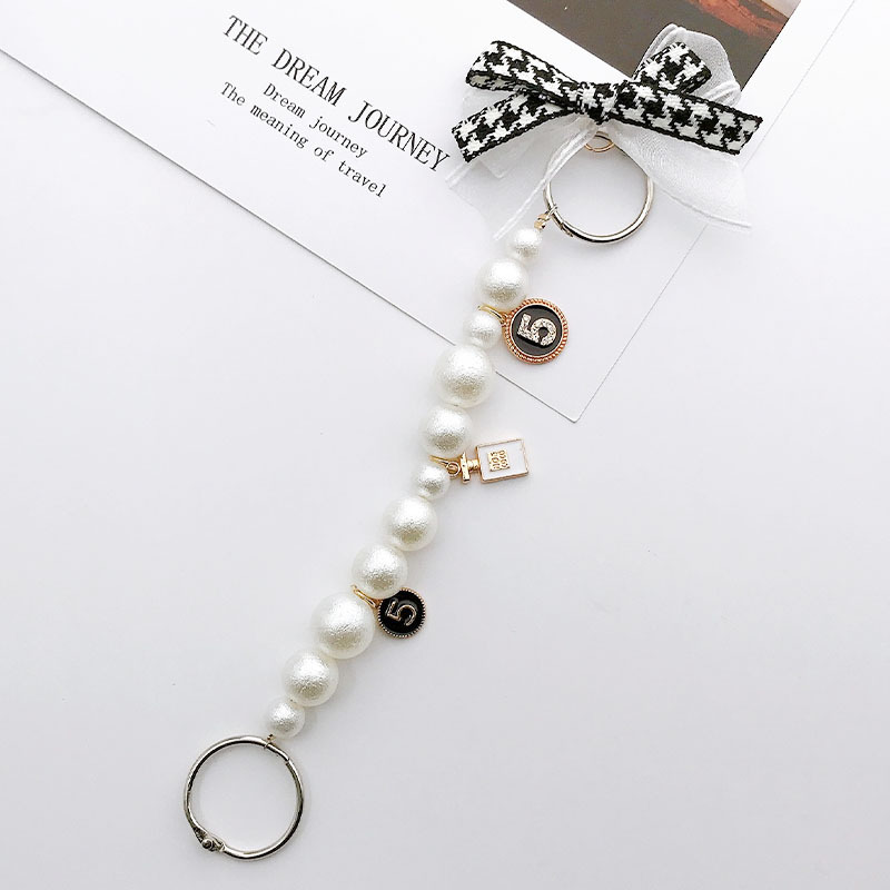 Picture of 2022 Yi Lian New Cave Shoes Accessories Bear Rhinestone Shoe Buckle Accessories Pearl Hanging Chain Slippers I-Buckle