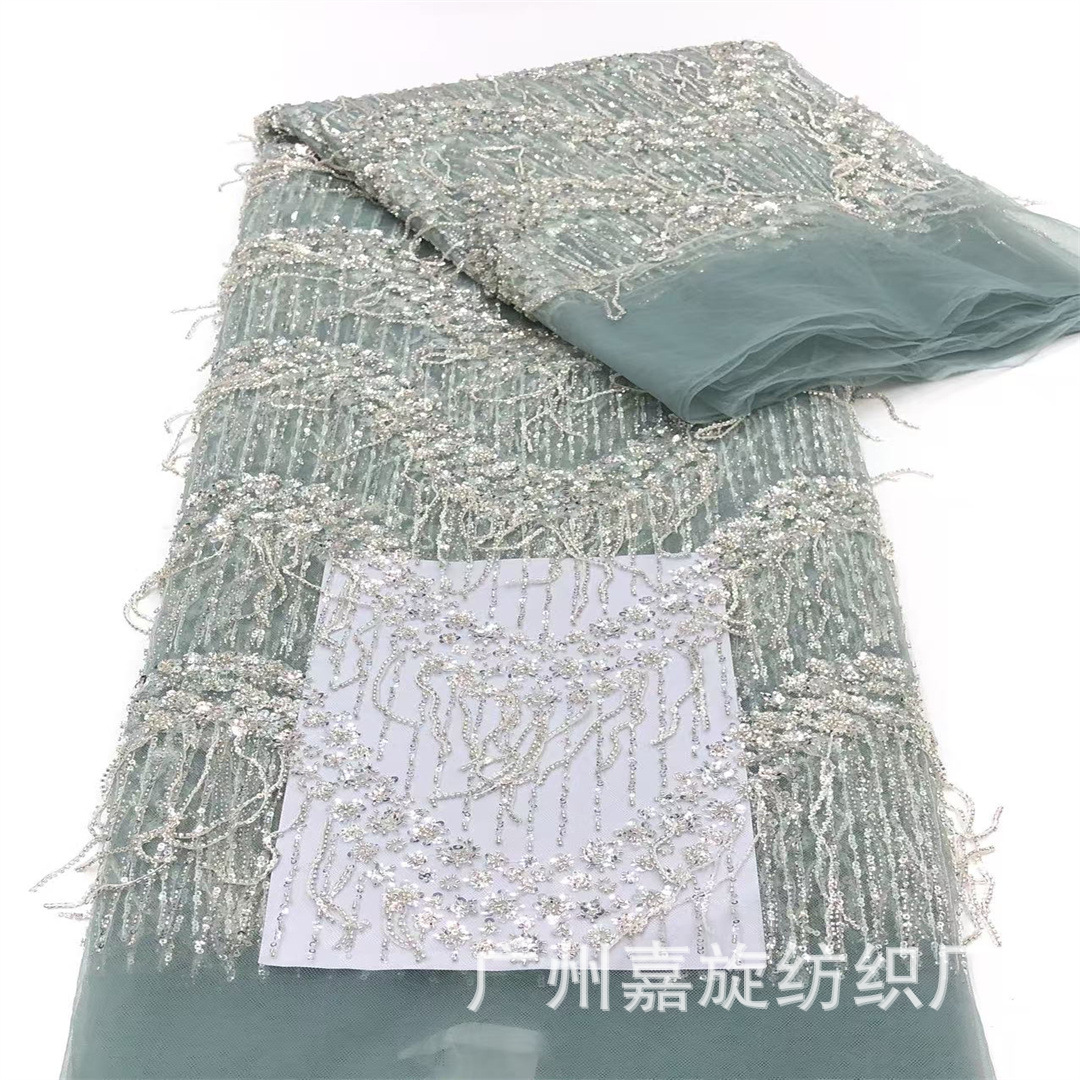 2025 New European and American Beaded Tassel Bead Tube Small Flower Big Wave Lace Fabric French Wedding Dress Performance Clothing Fabric