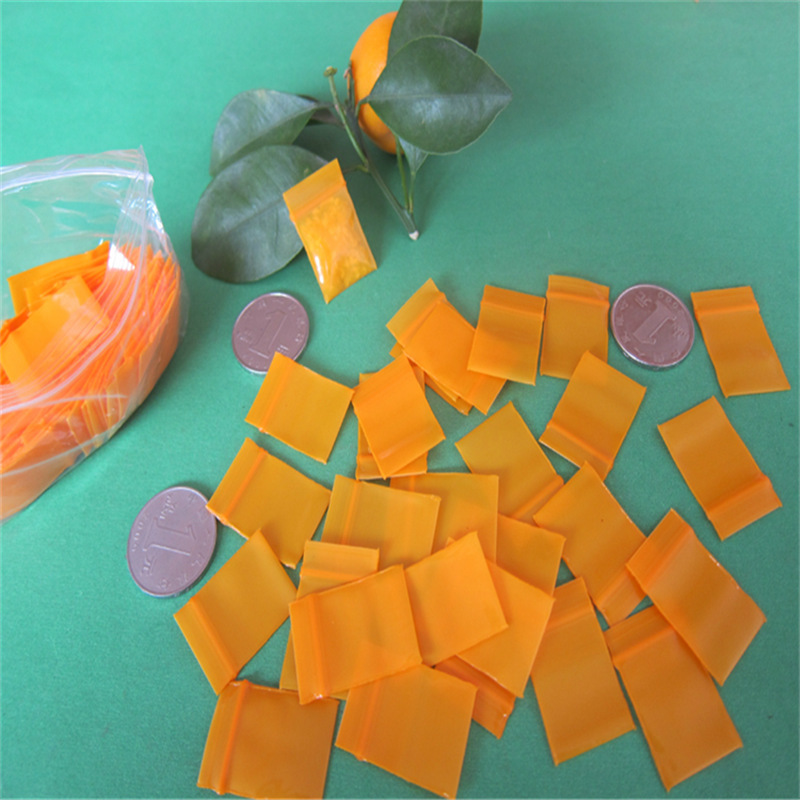 Self-sealing bag small compact bag factory spot 2.5*3*3*4 Orange blue red brown thick extra small pe transparent bone bag