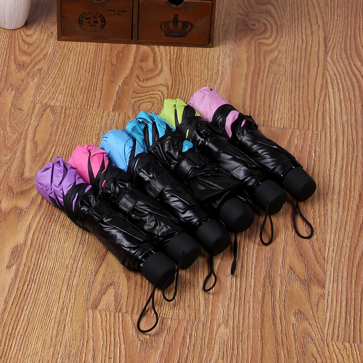 Picture of Factory wholesale creative three folding vinyl water flowering umbrella gift advertising umbrella umbrella can do LOGO