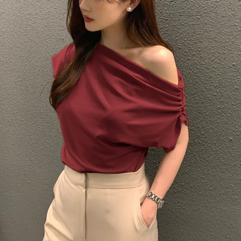 Picture of South Korea Chic Top Summer New Niche Irregular Slant Shoulder Design Sense Loose Solid Color Pullover Short-sleeved T-shirt