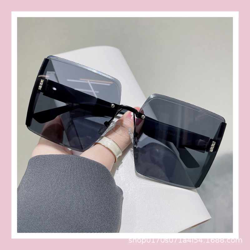 Picture of Em Home 2025 New Frameless Sunglasses Women's Glitter Mirror Edge Anti-Uv Big Face Slimming Live Broadcast Sunglasses