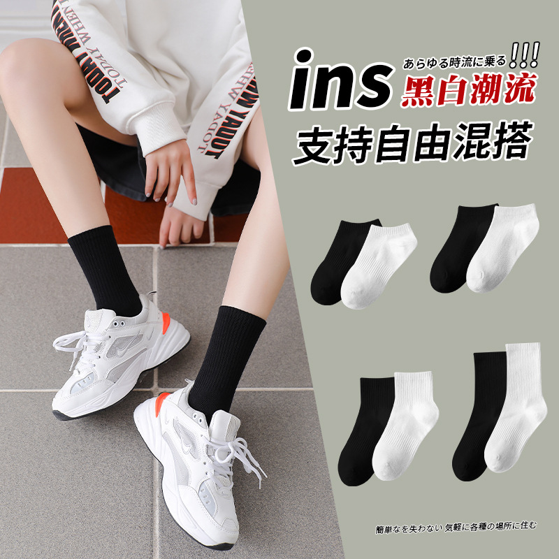 Black socks Women's Mid-tube socks spring and autumn solid color ins trendy white socks women's wholesale summer thin long tube men's socks
