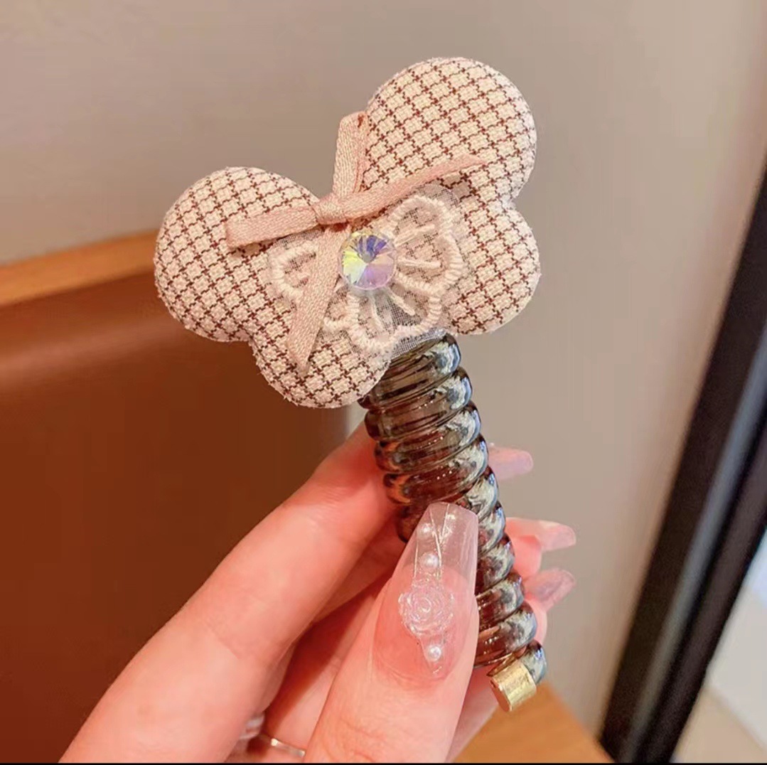 Picture of Children's coil telephone line hair band female high ponytail does not hurt hair hair rope high elastic durable rubber band Braid artifact