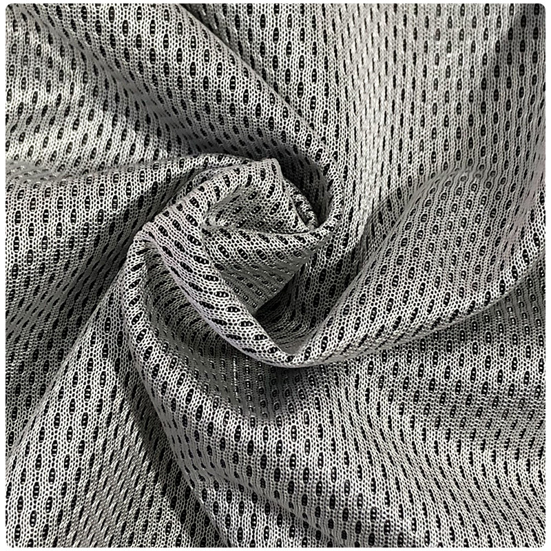 Manufacturer in stock weft knitted polyester two-color mesh clothing shoes bag white surface black bottom interwoven two-color bird eye cloth