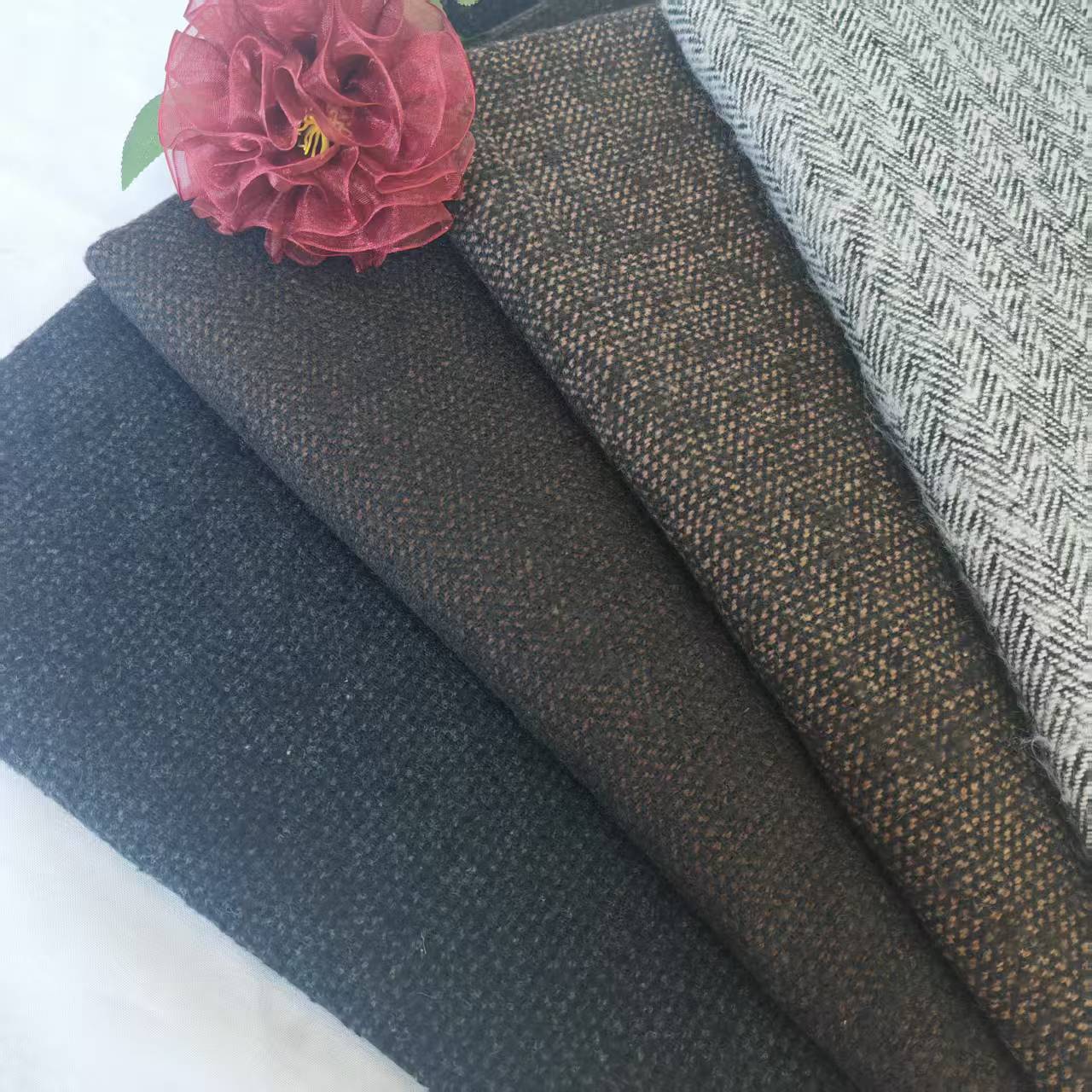 Shaoxing manufacturer spot autumn and winter 25 new herringbone coat woolen fashion suits, shoes and hats, bags, coarse woolen fabrics