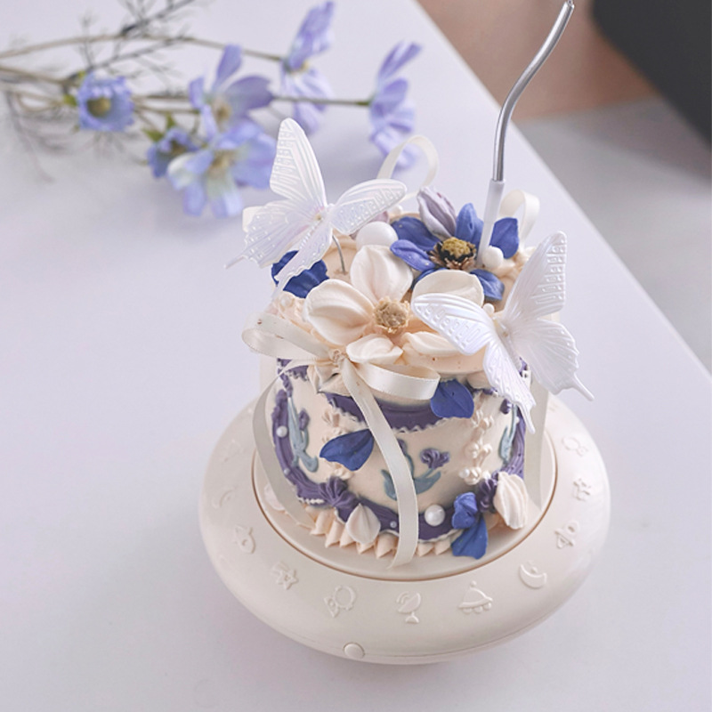 Picture of Rotary dessert birthday driver automatic rotating dessert machine rotary dessert machine cake display stand birthday party decoration