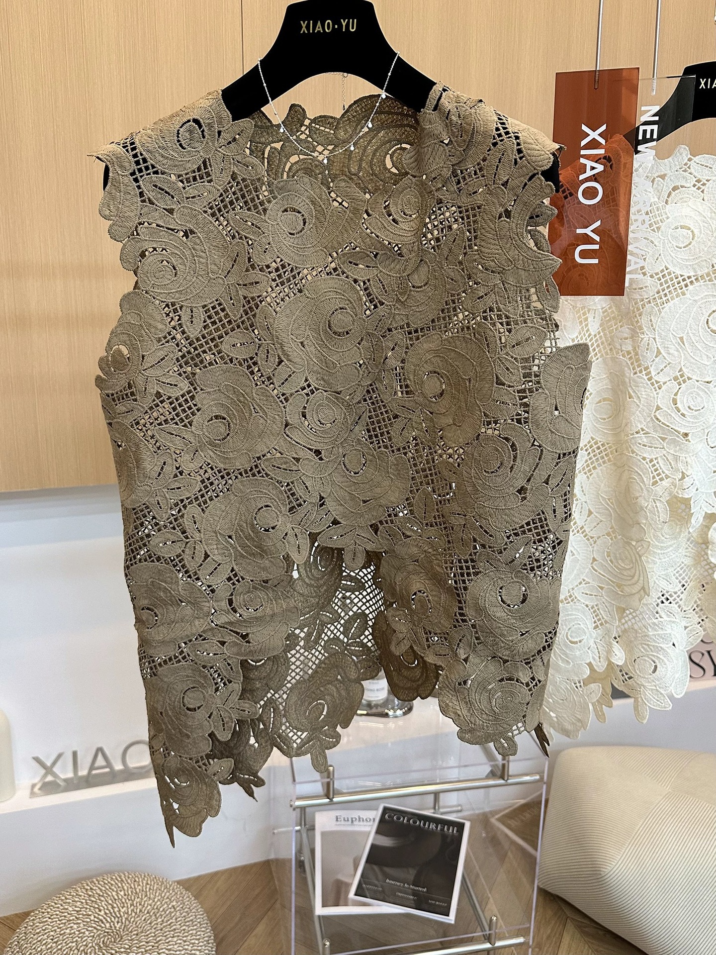Picture of High-end European summer new unique hook flower hollow irregular hem sleeveless vest lace shirt girl
