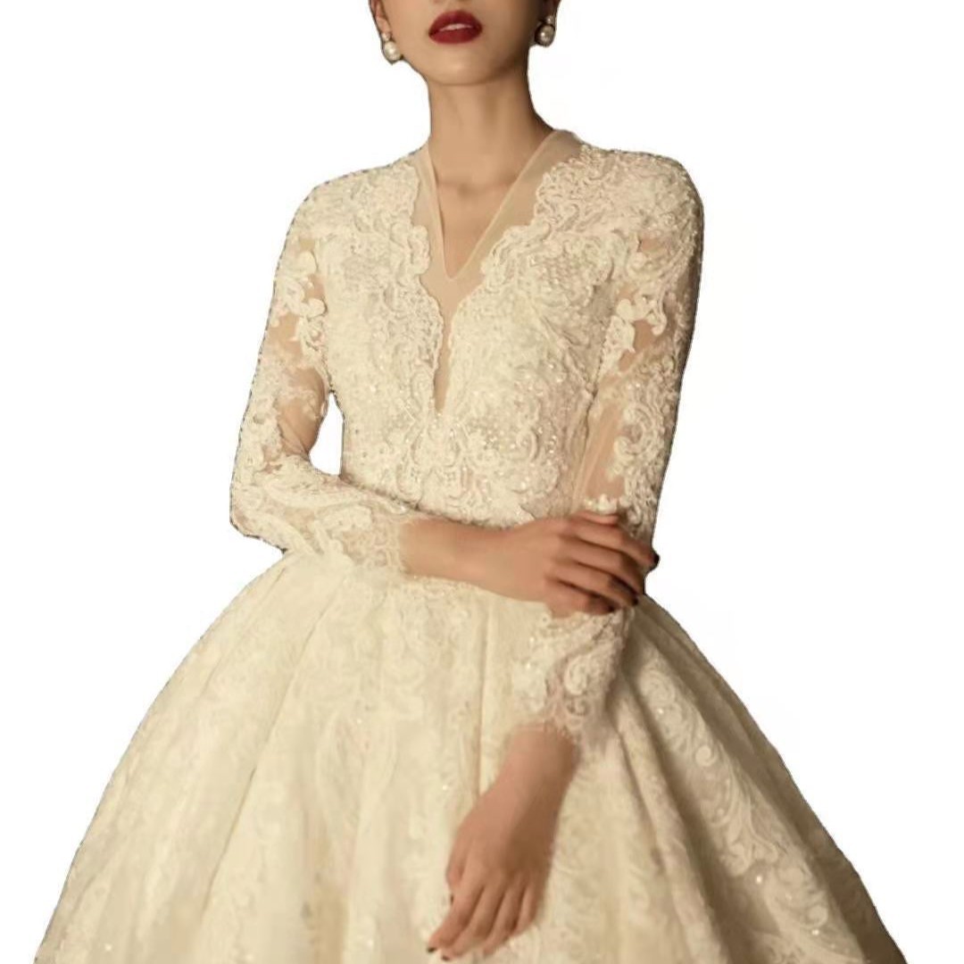 Picture of Freight 21 Wedding Dress European and American Craft Long Sleeve Middle Pearl Button-down Long Trailing Palace Photo Studio Wedding Performance