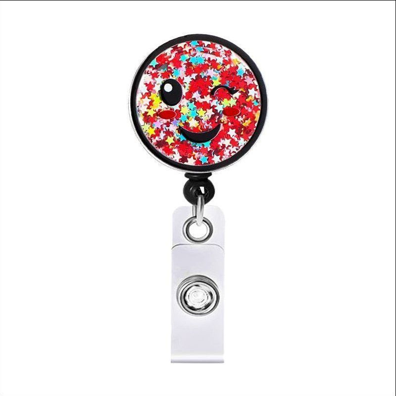 Picture of Acrylic Hollow Sand Easy Pull Buckle Cartoon Smiley Needle Retractable Rotating Easy Pull Badge Reel