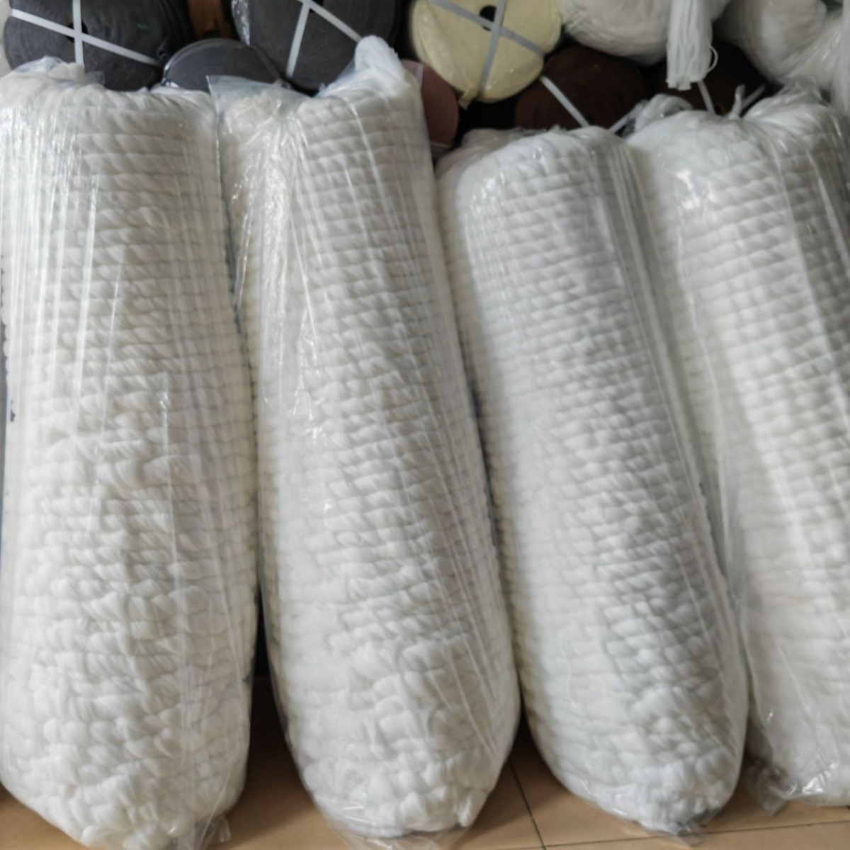 Specializing in the production of polyester high elastic yarn twisted Gabon 600D pure white polyester yarn raw material strand and line