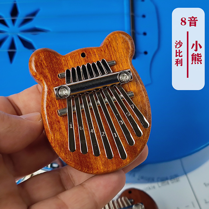 Picture of Mini Thumb 8-Tone Mini Calimba Crystal Transparent Five-Finger Portable Beginner's Finger Instrument