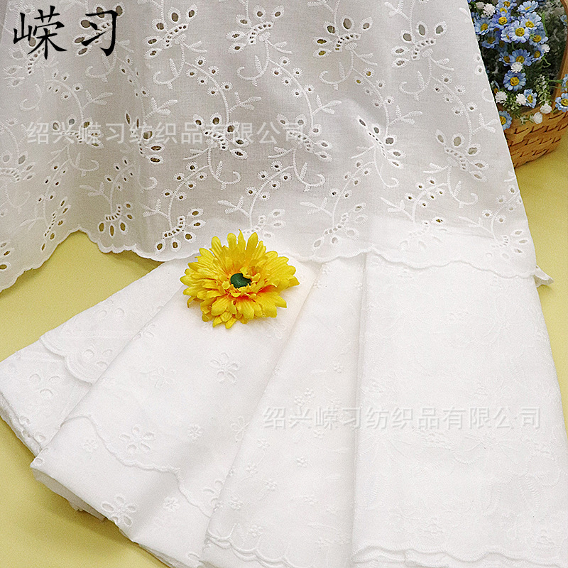 in stock variety of pure cotton hollow embroidered fabric bilateral positioning perforated spring and summer children's clothing dress white embroidered fabric