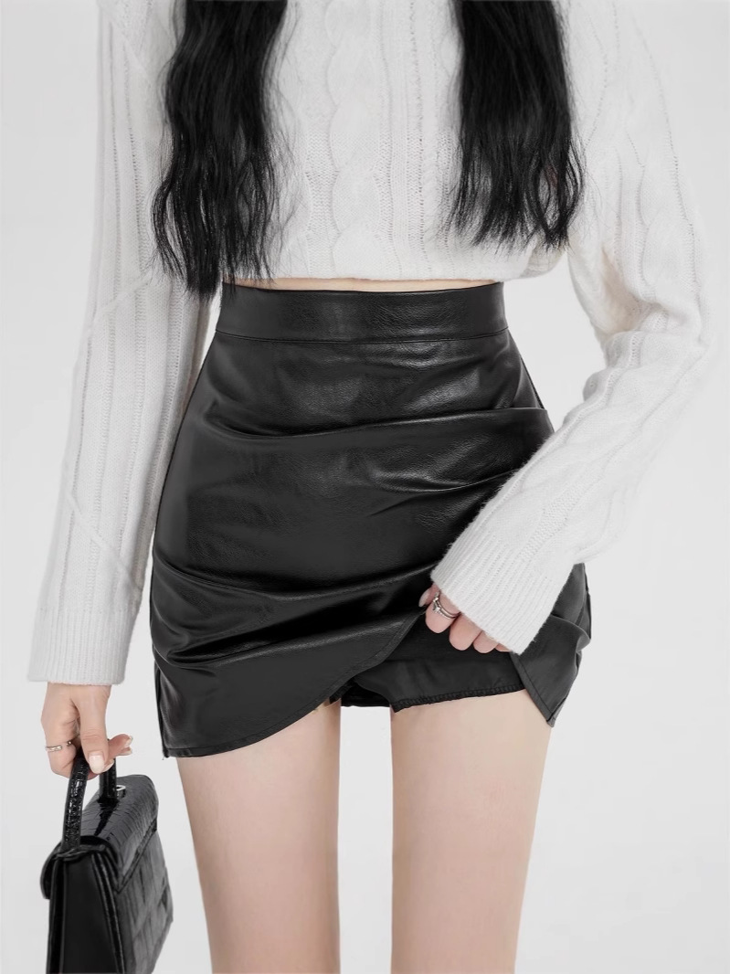 Irregular pu leather skirt skirt women's autumn and winter new anti-light hot girl high waist slim A- line hip short skirt