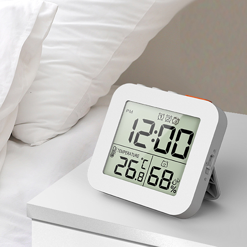 Amazon new LCD temperature and humidity clock electronic digital temperature and humidity display three sets of alarm clock can be magnetic