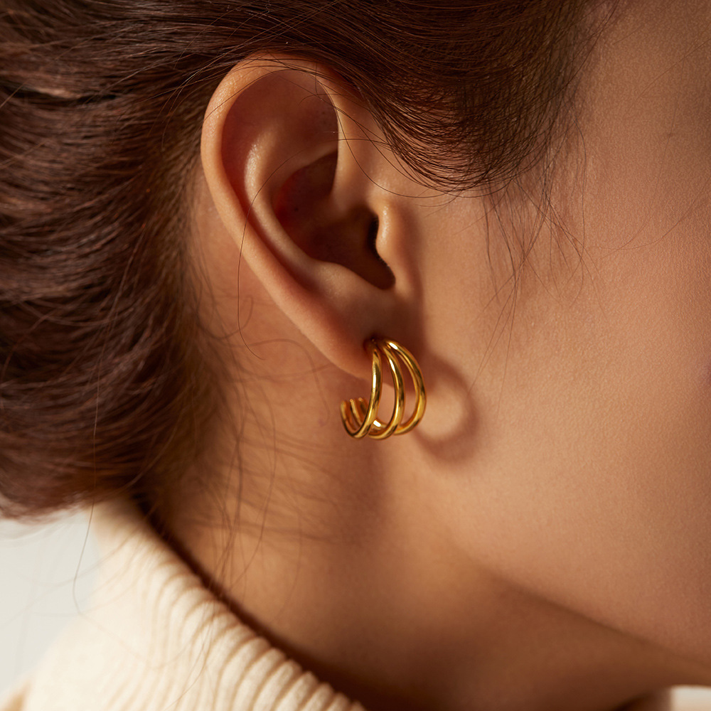 Europe and the United States cross-border fashion creative design smooth three-line earrings temperament all-match hollow earrings girl style jewelry