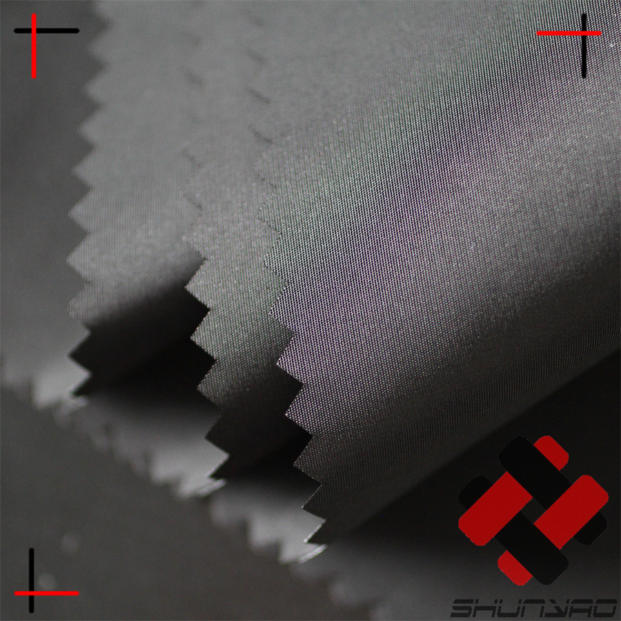 Shunyao semi-elastic weft twist imitation memory waterproof black semi-elastic Huayao jacket fabric