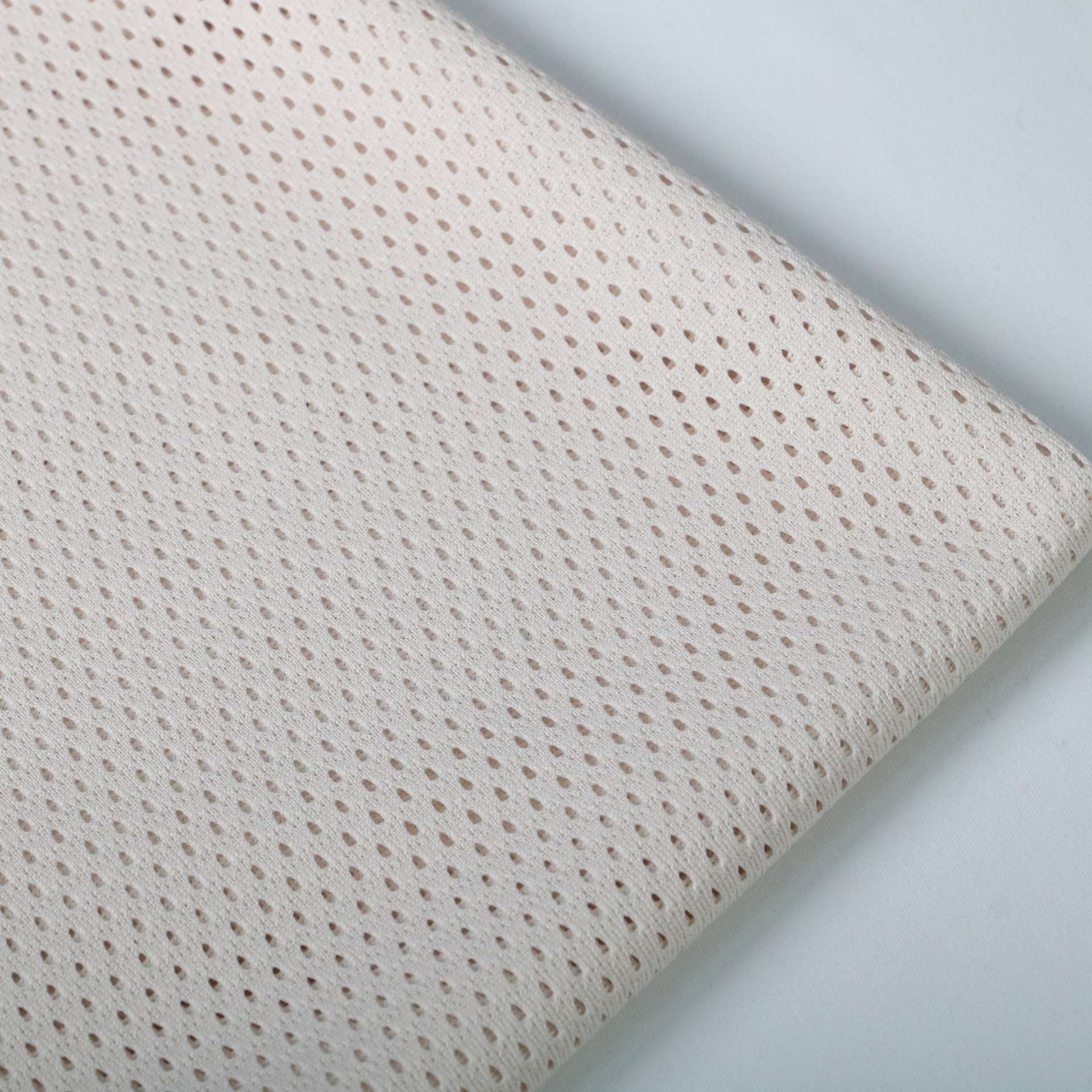 Picture of in stock Polyester Warp Knitted Low Elastic Bullet Hole Triangle Cloth Peach Mesh Breathable Moisture-wicking Sportswear Lining