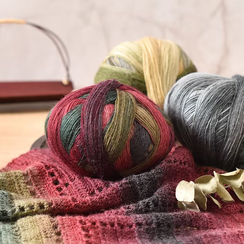 Factory wholesale magic ball rainbow thread hand woven hooked hat scarf diy material bag magic ball segment dyed wool ball