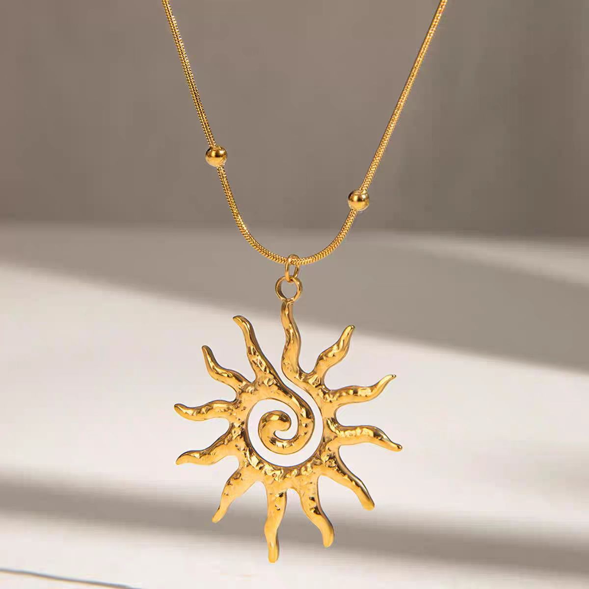 Picture of Cross-Border New Sun Pendant Titanium Steel Necklace Earrings Ring Women's Design Light Luxury Niche High-End Jewelry Set